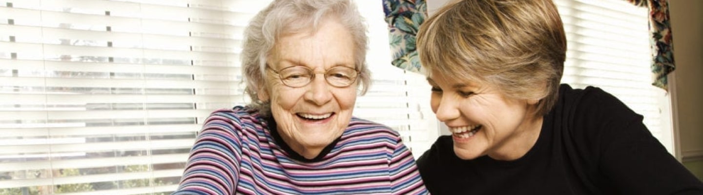 Two people smiling