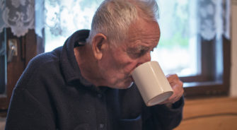 Old man drinking tea