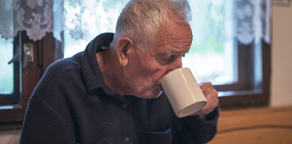 Old man drinking tea