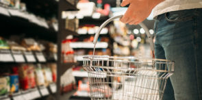 A man holding a shopping basket