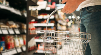 A man holding a shopping basket