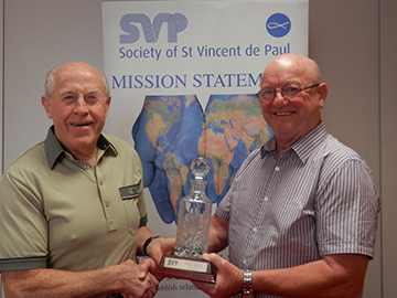 Presentation by Donal Kelly (left), South West Regional President to David Holden (right), outgoing Cork Regional President.