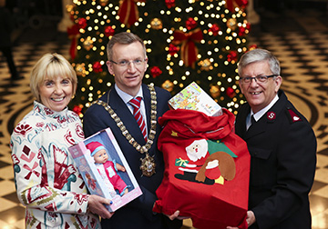 Belfast’s Lord Mayor, Alderman Brian Kingston joins Pauline Brown, Regional Manager for St Vincent de Paul and Major Elwyn Harries, Leader of the Salvation Army in Ireland to launch the 37th annual Christmas Family Appeal at Belfast City Hall.