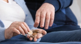 A man about to take his wife's change