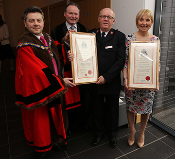Limavady Mayor Alan Robinson and council Chief Executive Liam Flanagan present the ‘Freedom of the Borough’ to Paul Wright from the Salvation Army and Pauline Brown from St Vincent de Paul