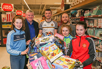 Pictured at the trolley dash are Ava Finnegan, St Paul’s, Belfast; Archie Kinney, Regional Vice President of SVP; Dermot McAleese of Portglenone; Iain Semple, Manager of Sainsbury’s Supermarket, Kennedy Centre; Meabh Kelly of Sarsfields, Belfast and Lauren Carey of St Paul’s, Belfast.