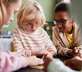 A girl plays with her friends