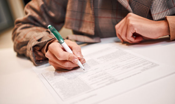 Garda Vetting - A person filling out a form
