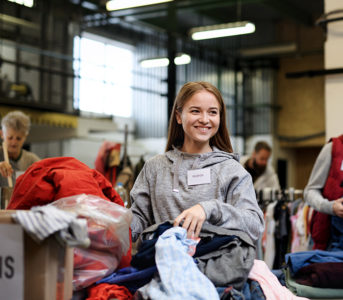 A happy girl at a clothing factory