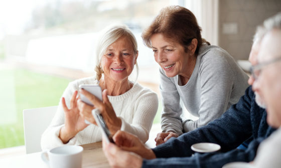 Elder people using phones