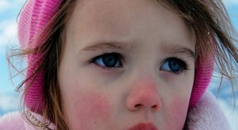 Girl in pink coat