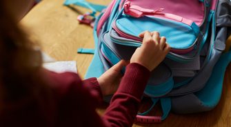 A girl opening a bag