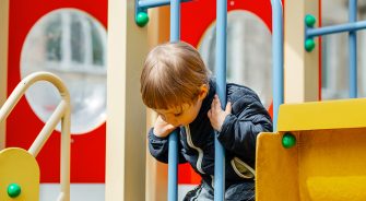 A kid playing in the park