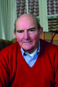 Retired man sit on arm chair