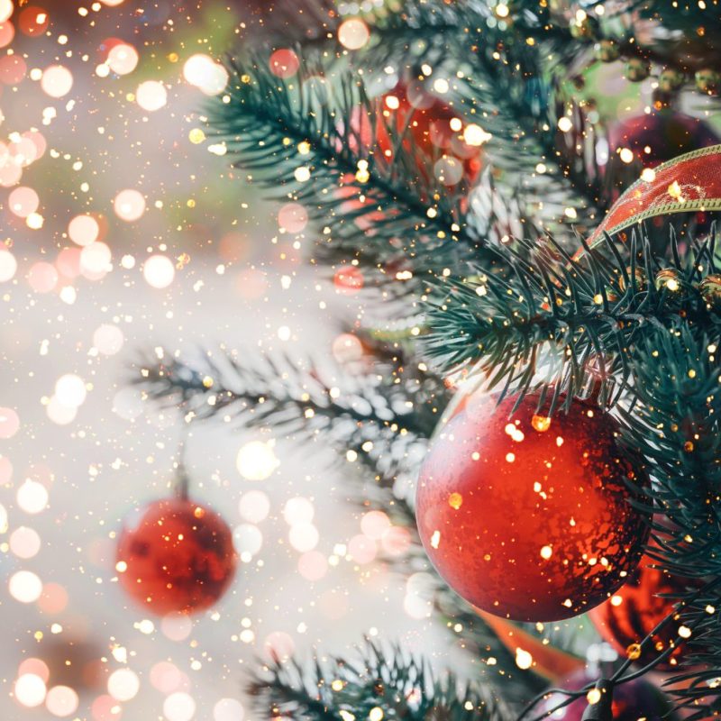 A Christmas tree with a red bauble