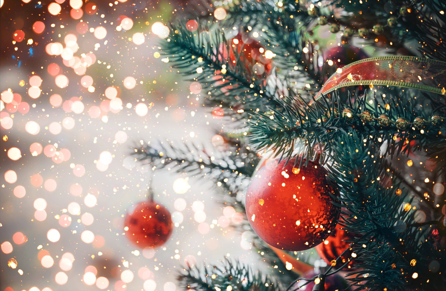 A Christmas tree with a red bauble